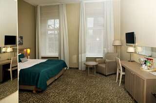Отель City Hotels Algirdas Вильнюс Улучшенный двухместный номер с 1 кроватью или 2 отдельными кроватями-1